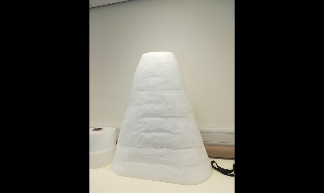 A mount of plastazote used to package a textile object.